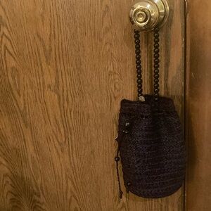 Cute,small black purse to carry phone and a couple other small necessities